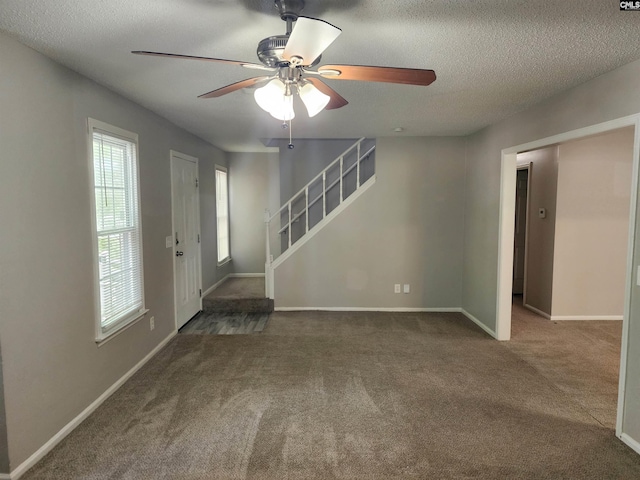 325 Trinity Three Rd, Irmo, SC 29063 - entrance foyer featuring plenty of natural light, stairway, carpet, a ceiling fan, and a textured ceiling