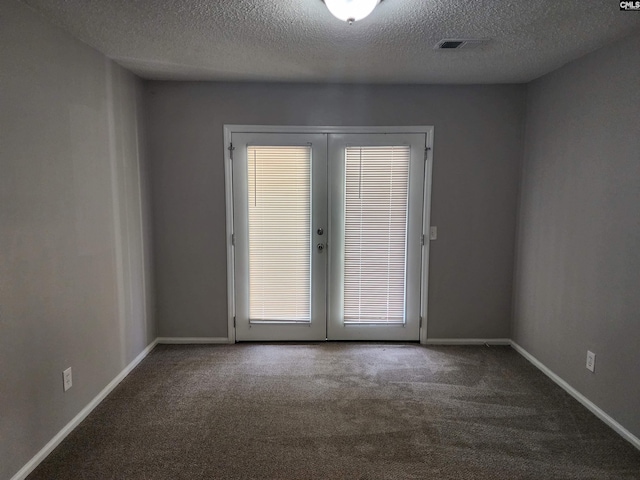 325 Trinity Three Rd, Irmo, SC 29063 - spare room featuring french doors, carpet flooring, and a textured ceiling