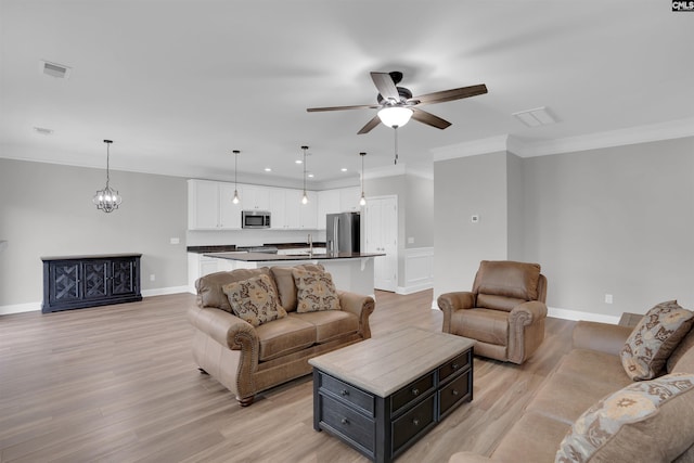 935 Taramore Ln, Lexington, SC 29072 - living area featuring a ceiling fan, light wood finished floors, ornamental molding, and recessed lighting