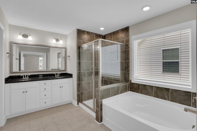 935 Taramore Ln, Lexington, SC 29072 - full bath featuring double vanity, a garden tub, a stall shower, and tile patterned flooring