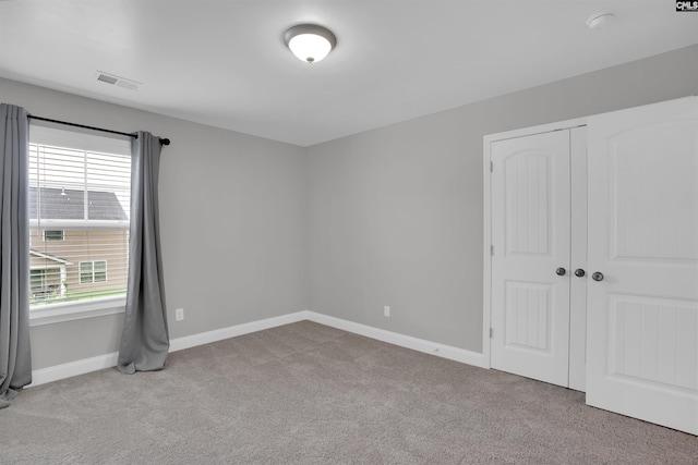 935 Taramore Ln, Lexington, SC 29072 - unfurnished bedroom featuring carpet floors and a closet