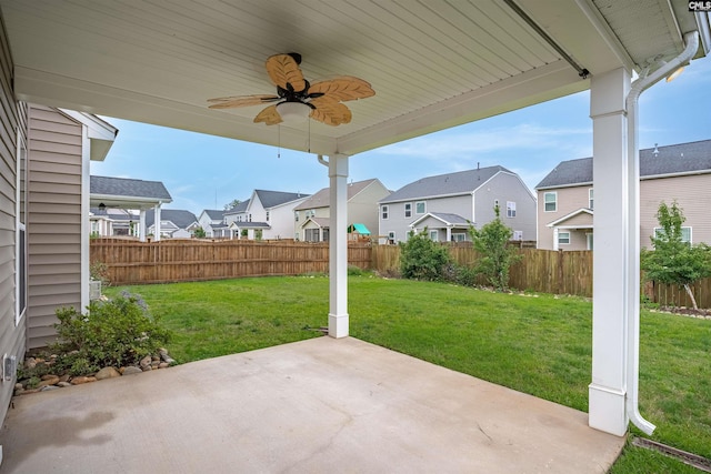 935 Taramore Ln, Lexington, SC 29072 - fenced backyard with a residential view, a patio, and a ceiling fan