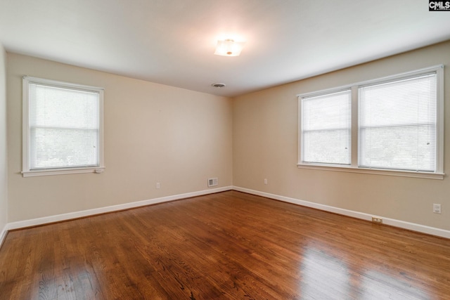 6413 Bridgewood Rd, Columbia, SC 29206 - spare room with wood finished floors and baseboards