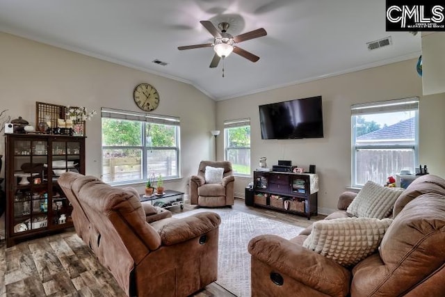 1817 Crystal Ln, West Columbia, SC 29170 - living room with crown molding, wood finished floors, plenty of natural light, a ceiling fan, and lofted ceiling