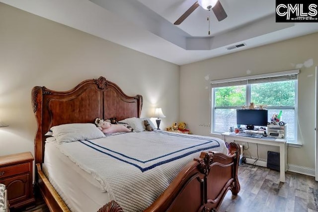 1817 Crystal Ln, West Columbia, SC 29170 - bedroom with a raised ceiling, wood finished floors, a ceiling fan, and an office area