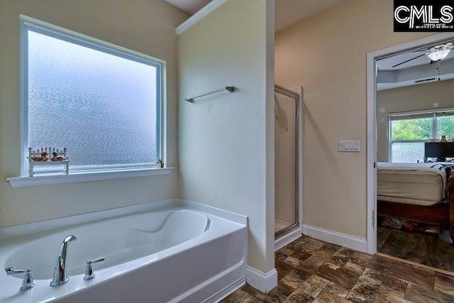 1817 Crystal Ln, West Columbia, SC 29170 - full bath featuring a bath, a stall shower, and stone finish flooring