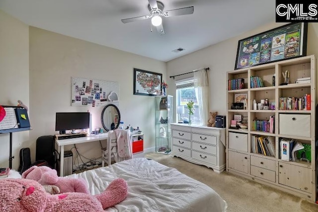 1817 Crystal Ln, West Columbia, SC 29170 - bedroom with light colored carpet, ceiling fan, and a desk