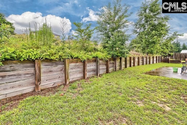 1817 Crystal Ln, West Columbia, SC 29170 - fenced backyard featuring a patio area