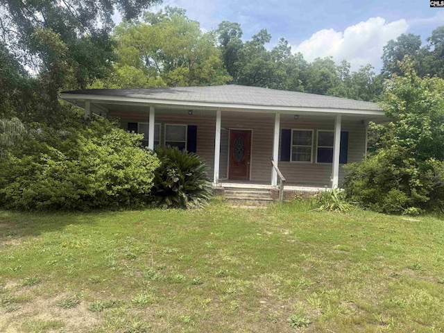 4200 Bluff Rd, Columbia, SC 29209 - view of front facade with a porch and a front lawn