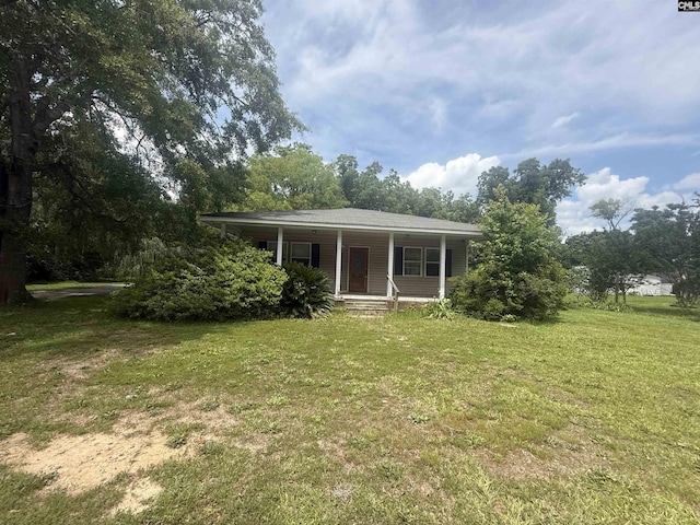 4200 Bluff Rd, Columbia, SC 29209 - view of front of home with covered porch and a front yard