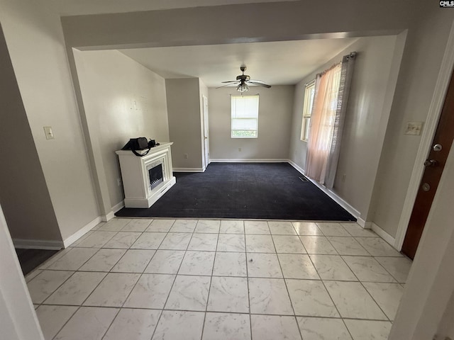 4200 Bluff Rd, Columbia, SC 29209 - unfurnished living room featuring a ceiling fan, a fireplace, marble look tile flooring, and carpet floors