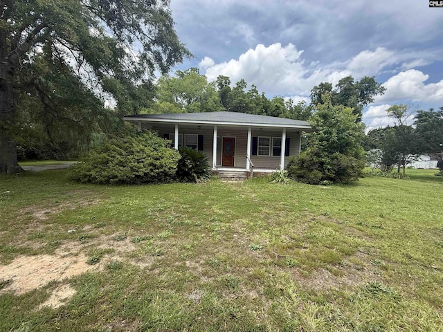 4200 Bluff Rd, Columbia, SC 29209 - bungalow-style house featuring covered porch and a front lawn