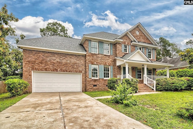 18 Ridgetop Ct, Columbia, SC 29229 - view of front of house featuring brick siding, covered porch, driveway, a front lawn, and a garage