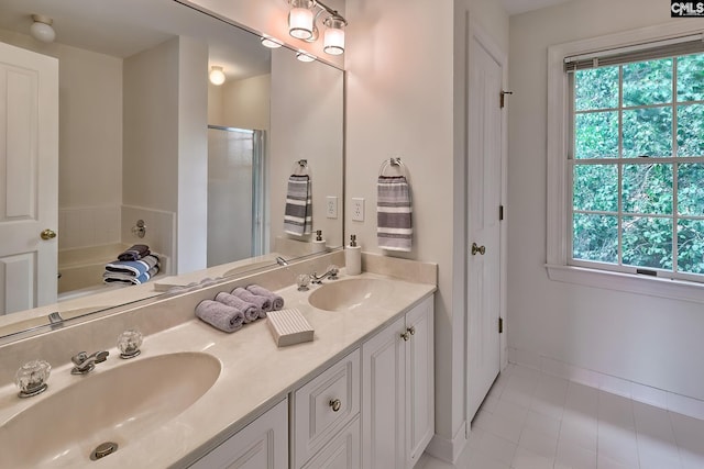 18 Ridgetop Ct, Columbia, SC 29229 - bathroom featuring tile patterned flooring, double vanity, plenty of natural light, and a stall shower