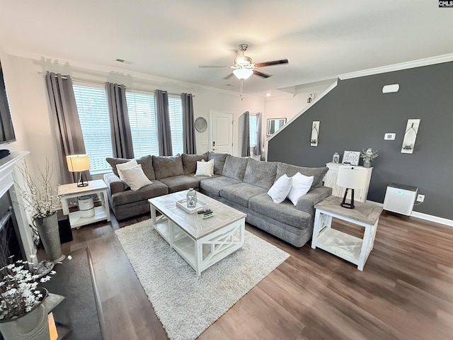 122 Tannery Way, Lexington, SC 29073 - living room featuring crown molding, dark wood finished floors, a ceiling fan, and a fireplace