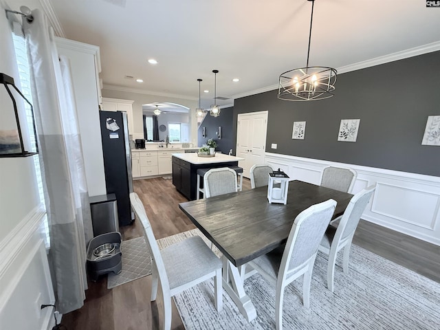 122 Tannery Way, Lexington, SC 29073 - dining space with dark wood-style floors, ornamental molding, wainscoting, recessed lighting, and ceiling fan