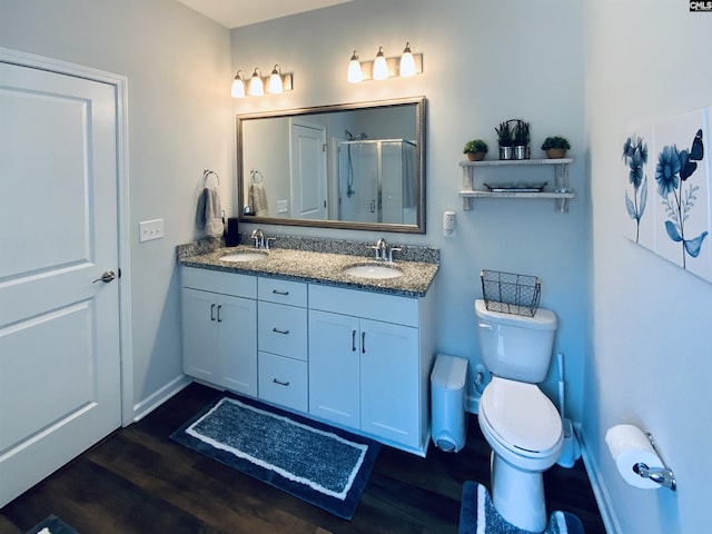 122 Tannery Way, Lexington, SC 29073 - bathroom with wood finished floors, double vanity, and a shower with shower door