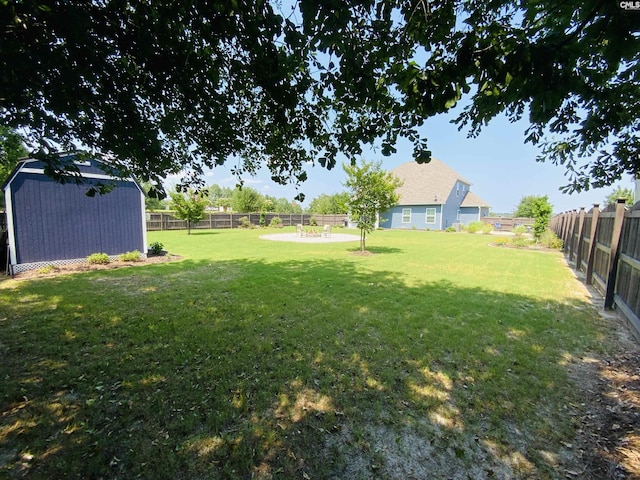 122 Tannery Way, Lexington, SC 29073 - fenced backyard featuring a storage unit