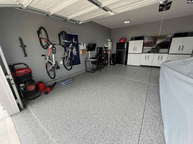 122 Tannery Way, Lexington, SC 29073 - garage with freestanding refrigerator and a garage door opener