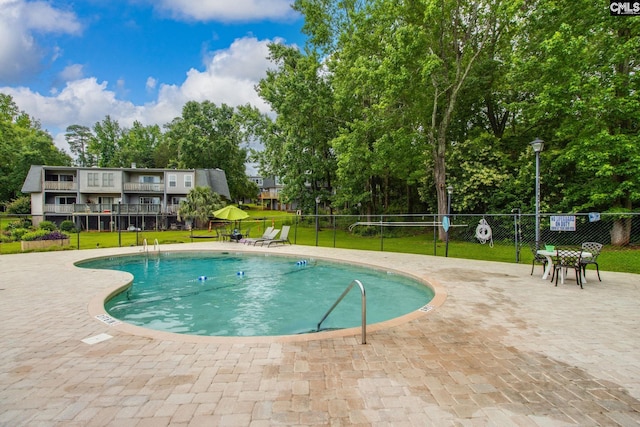 301 Harbor Heights Dr Unit 17D, Lexington, SC 29072 - community pool with a patio and view of wooded area