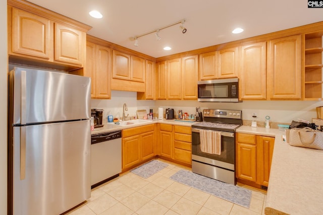 301 Harbor Heights Dr Unit 17D, Lexington, SC 29072 - kitchen with stainless steel appliances, light countertops, open shelves, light brown cabinets, and recessed lighting