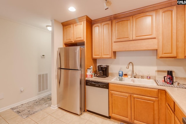 301 Harbor Heights Dr Unit 17D, Lexington, SC 29072 - kitchen featuring stainless steel appliances, light countertops, light brown cabinetry, crown molding, and light tile patterned flooring