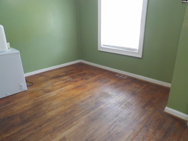 1016 Willis St, Batesburg, SC 29006 - empty room with hardwood / wood-style floors and washer / clothes dryer