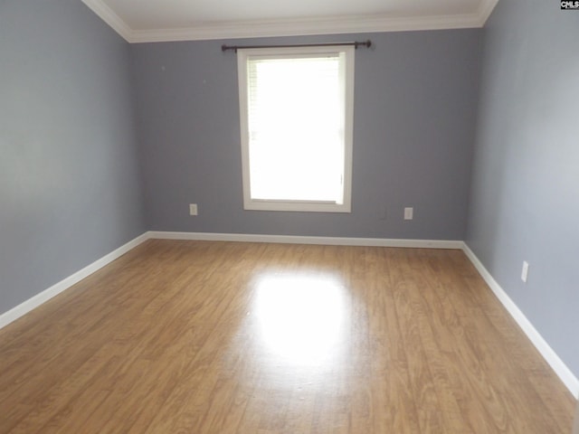 1016 Willis St, Batesburg, SC 29006 - empty room with wood finished floors and crown molding