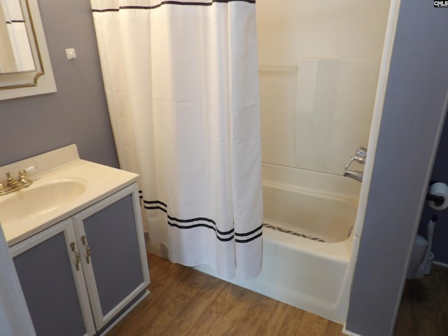 1016 Willis St, Batesburg, SC 29006 - bathroom with wood finished floors, vanity, and shower / tub combo