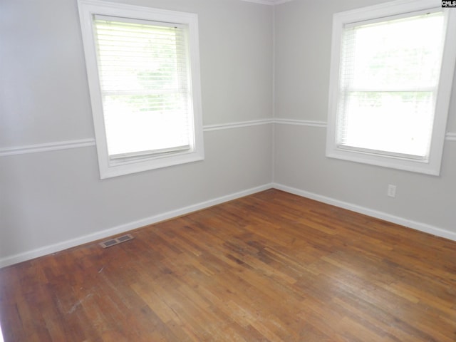 1016 Willis St, Batesburg, SC 29006 - empty room featuring healthy amount of natural light and hardwood / wood-style flooring