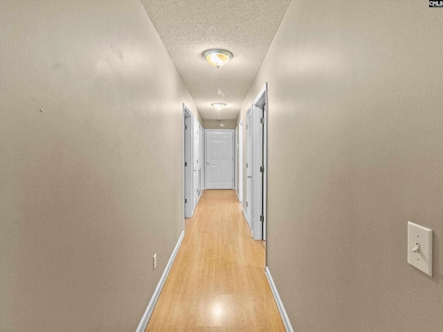 302 Brown St, Prosperity, SC 29127 - corridor with light wood-type flooring and a textured ceiling