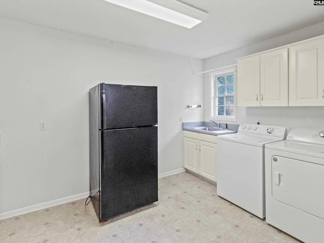 302 Brown St, Prosperity, SC 29127 - laundry room featuring separate washer and dryer, cabinet space, and light flooring