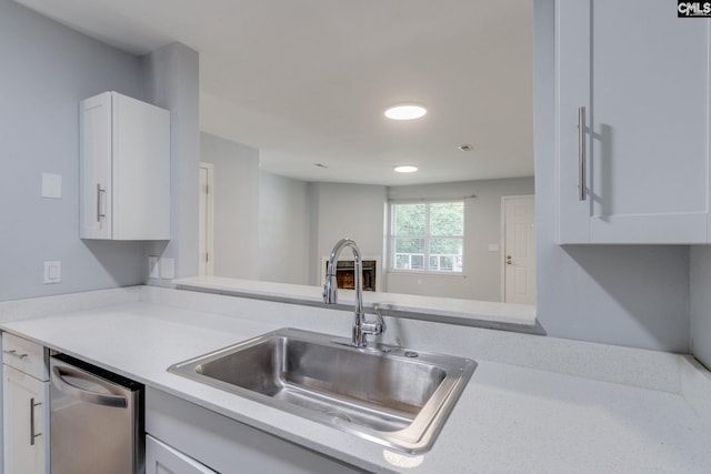 1320 Piney Grove Rd Unit 3C, Columbia, SC 29210 - kitchen with stainless steel dishwasher, white cabinetry, and recessed lighting