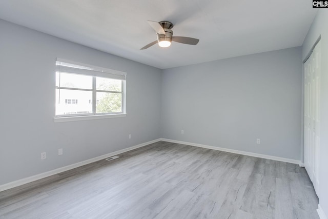 1320 Piney Grove Rd Unit 3C, Columbia, SC 29210 - unfurnished bedroom featuring wood finished floors, a closet, and ceiling fan