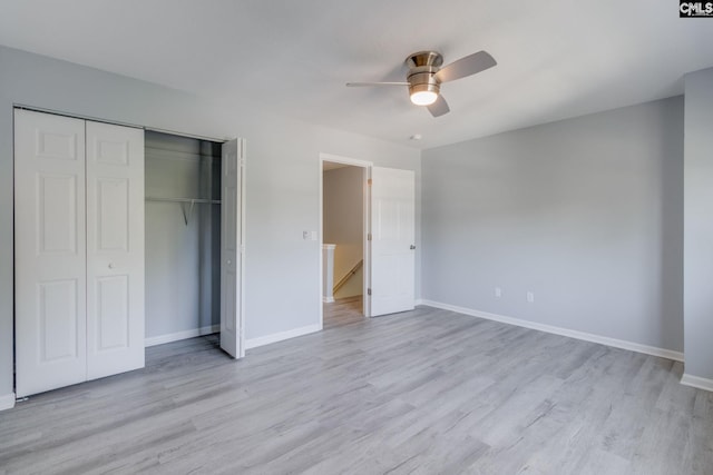 1320 Piney Grove Rd Unit 3C, Columbia, SC 29210 - unfurnished bedroom with light wood-type flooring, a closet, and a ceiling fan