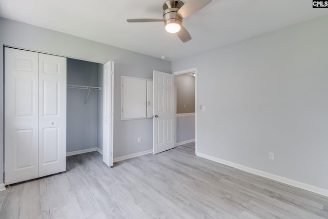 1320 Piney Grove Rd Unit 3C, Columbia, SC 29210 - unfurnished bedroom featuring wood finished floors, a closet, and a ceiling fan