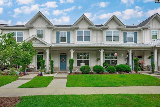 230 Eascott Pl, Columbia, SC 29229 - townhome / multi-family property featuring board and batten siding, a porch, and a standing seam roof