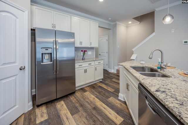 230 Eascott Pl, Columbia, SC 29229 - kitchen featuring stainless steel appliances, dark wood finished floors, white cabinetry, ornamental molding, and recessed lighting