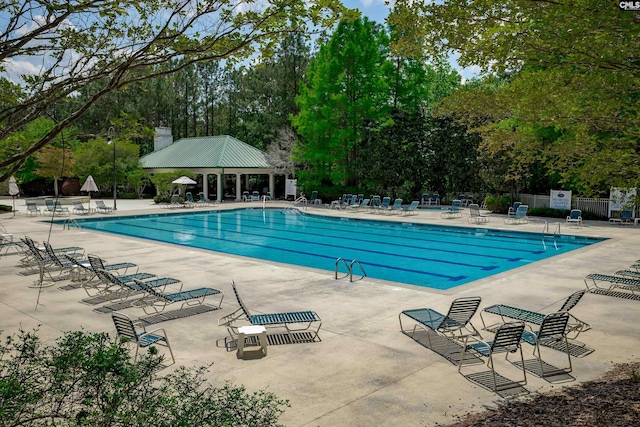 230 Eascott Pl, Columbia, SC 29229 - community pool featuring a patio area and view of scattered trees