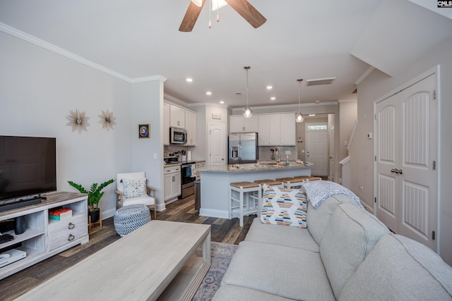 230 Eascott Pl, Columbia, SC 29229 - living area featuring ornamental molding, dark wood finished floors, a ceiling fan, and recessed lighting