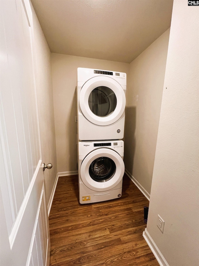 1406 Native Garden Rd, Gilbert, SC 29054 - laundry room featuring estacked washer and dryer and wood finished floors
