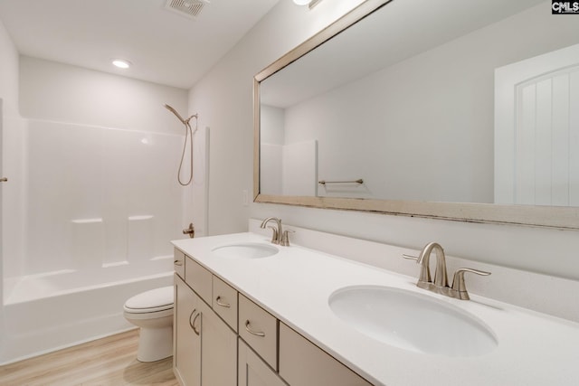 508 Esaw Dr, Elgin, SC 29045 - bathroom featuring double vanity, shower / tub combination, wood finished floors, and recessed lighting