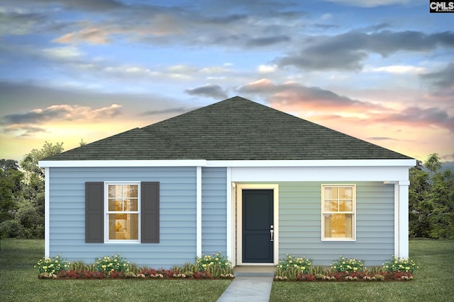 125 Hale Rd, Orangeburg, SC 29115 - view of front of house with a shingled roof and a yard