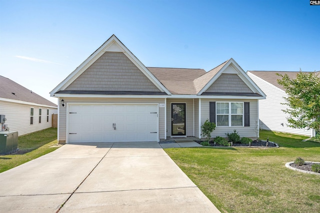 239 Common Reed Dr, Gilbert, SC 29054 - view of front facade with a front yard, an attached garage, and concrete driveway