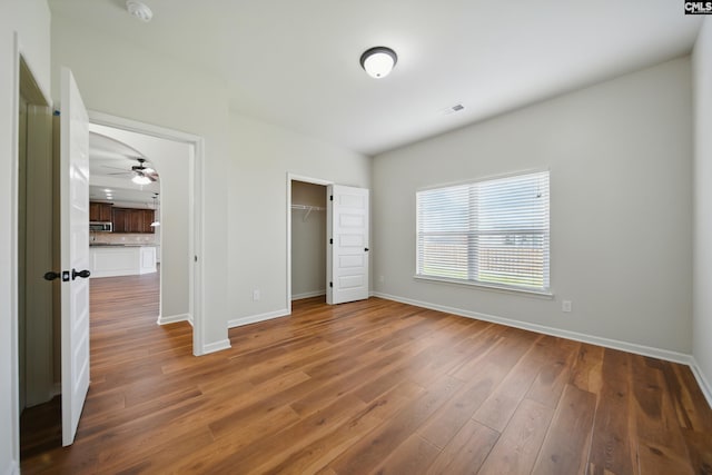 129 River Bridge Ln, Lexington, SC 29073 - unfurnished bedroom featuring wood finished floors and a closet