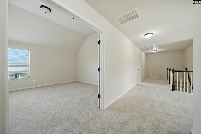 129 River Bridge Ln, Lexington, SC 29073 - additional living space with carpet flooring, lofted ceiling, and attic access