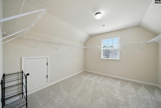 129 River Bridge Ln, Lexington, SC 29073 - walk in closet with vaulted ceiling and carpet floors