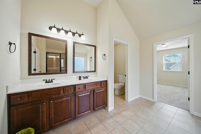 129 River Bridge Ln, Lexington, SC 29073 - bathroom with lofted ceiling, double vanity, and tile patterned flooring