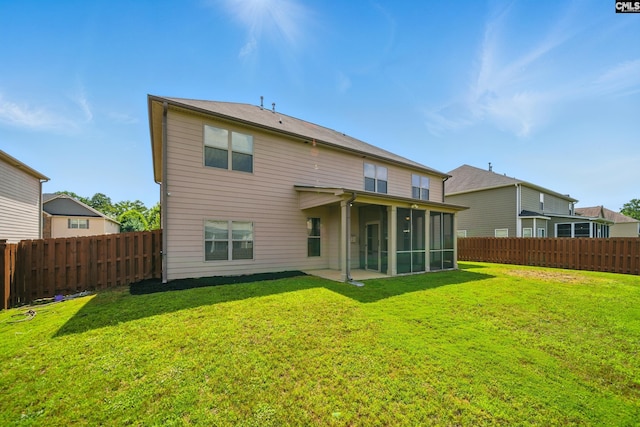 129 River Bridge Ln, Lexington, SC 29073 - rear view of property with a fenced backyard and a sunroom