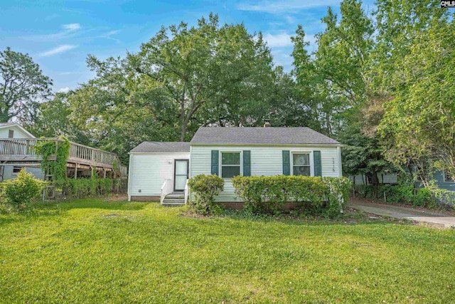 1715 Lacy St, Columbia, SC 29169 - view of front of property with a front yard and a chimney